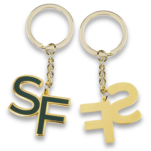 Брелки из золотого металла с логотипом "SF"